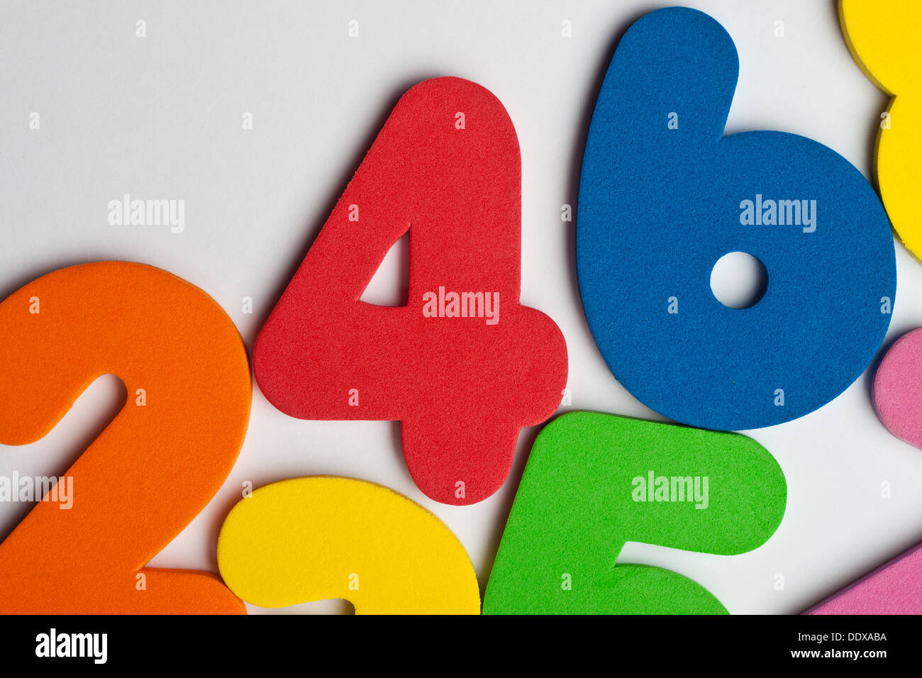 Colorful Foam Numbers On Green Background Stock Photo 120356005