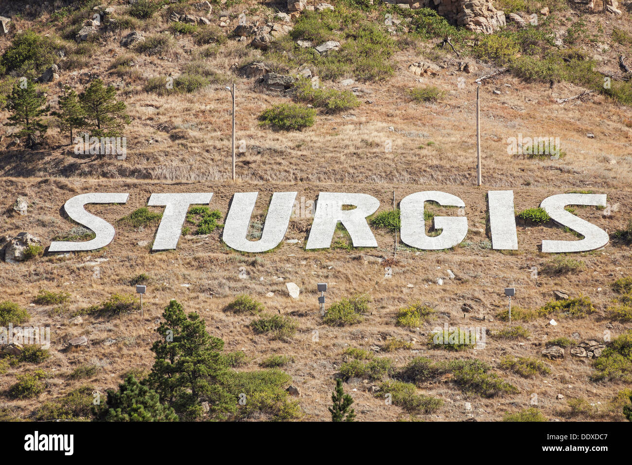 Sturgis sign on hillside, South Dakota Stock Photo