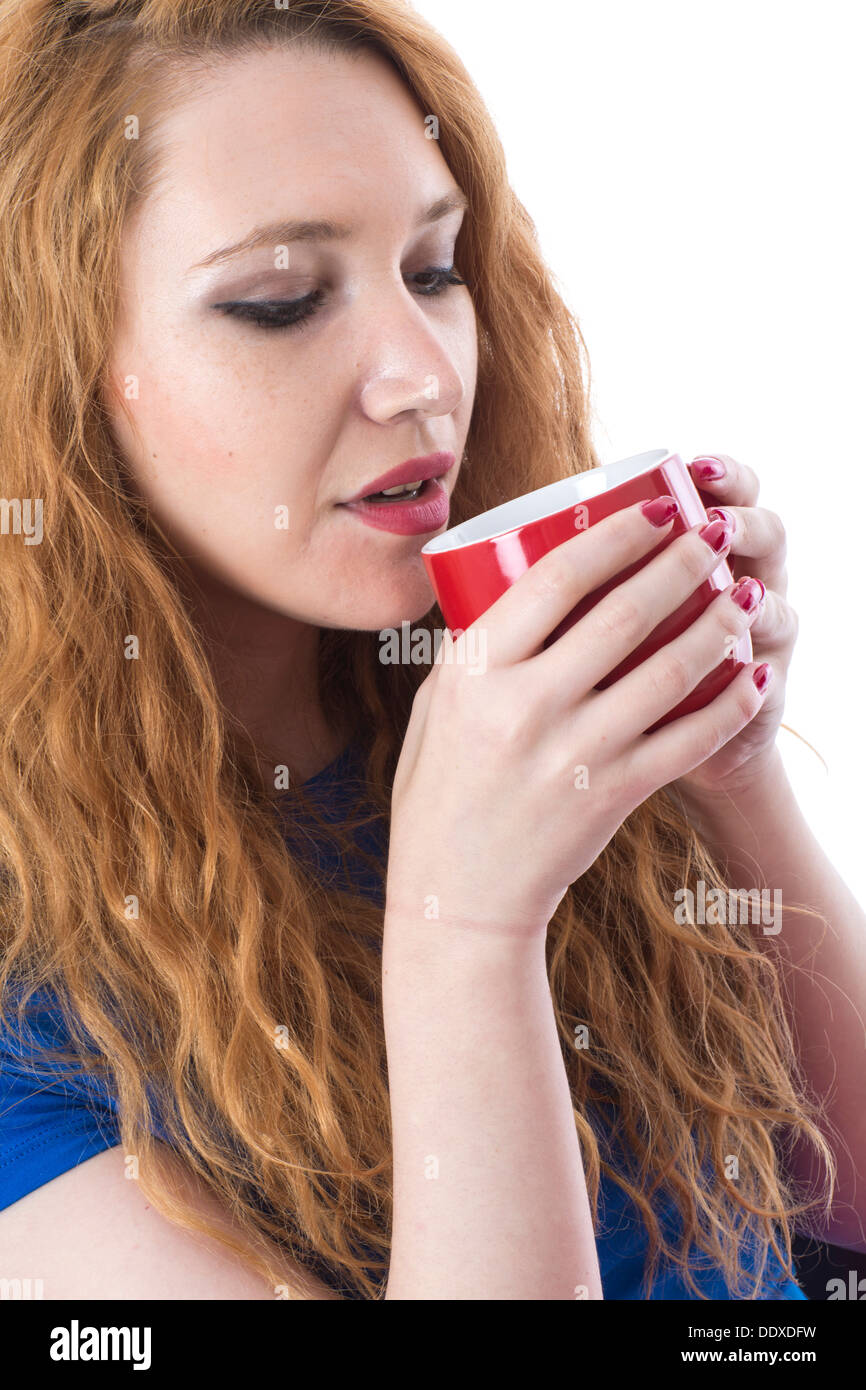 Model Released. Attractive Young Woman Drinking Tea Stock Photo Alamy