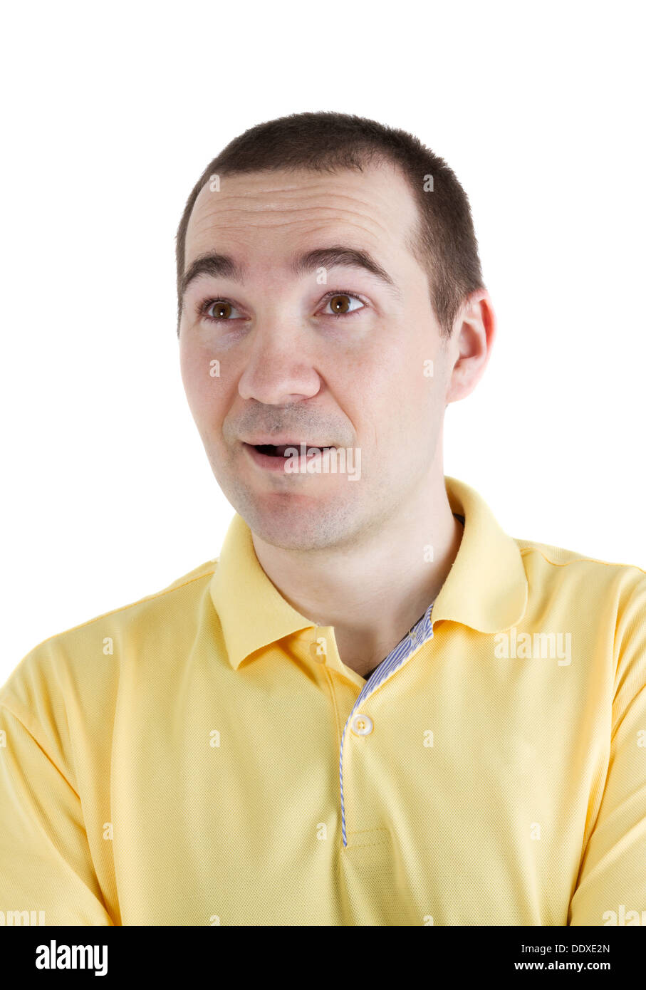 surprised man looking up on white background Stock Photo