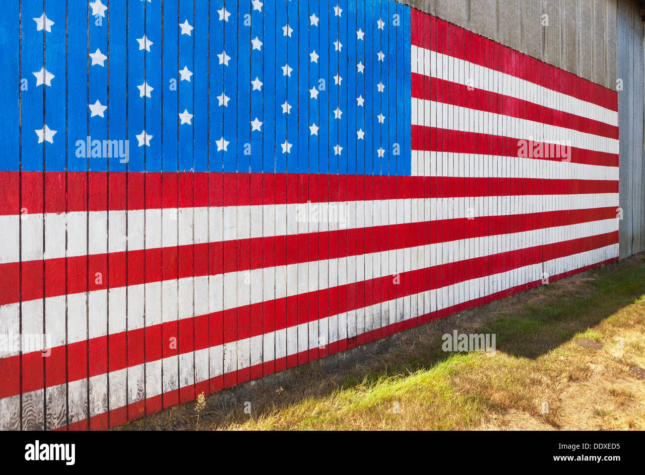 American flag on side of barn, Washington Stock Photo