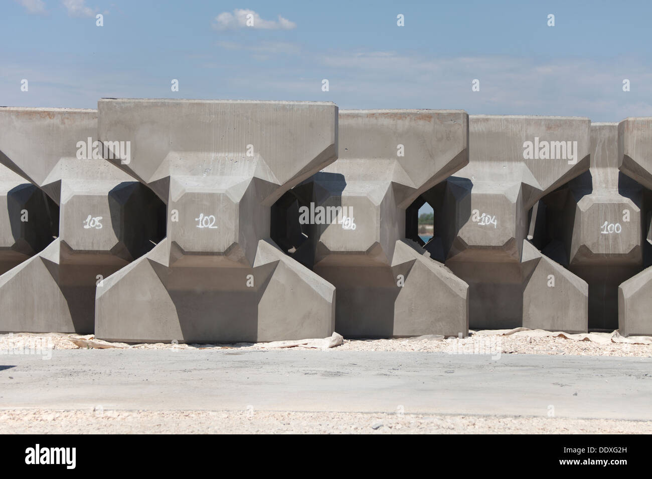 wavebreakers made of poured concrete using for protection of Stock