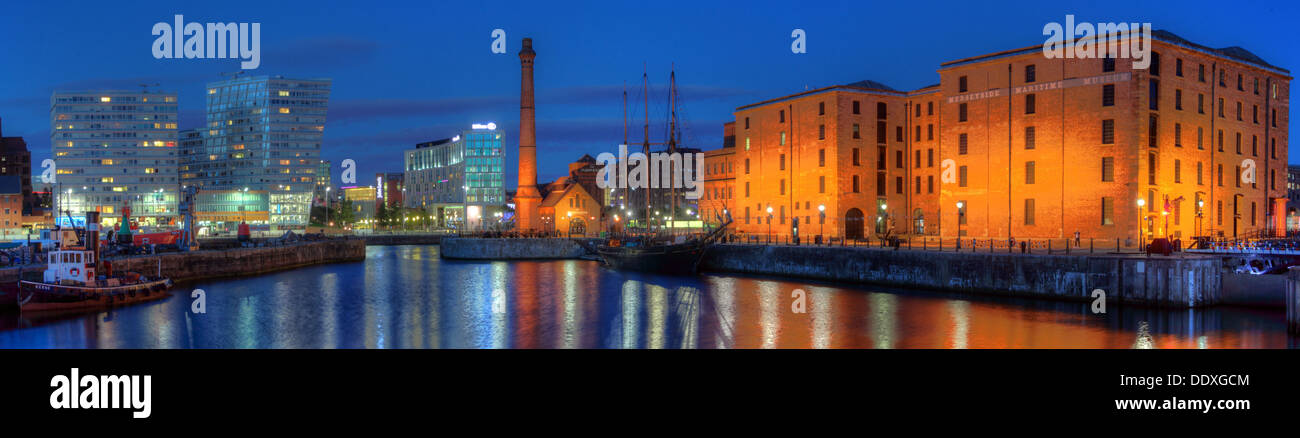 Dusk at the Albert Dock waterfront wide angle panorama Liverpool docks Merseyside England UK L3 4AA Stock Photo