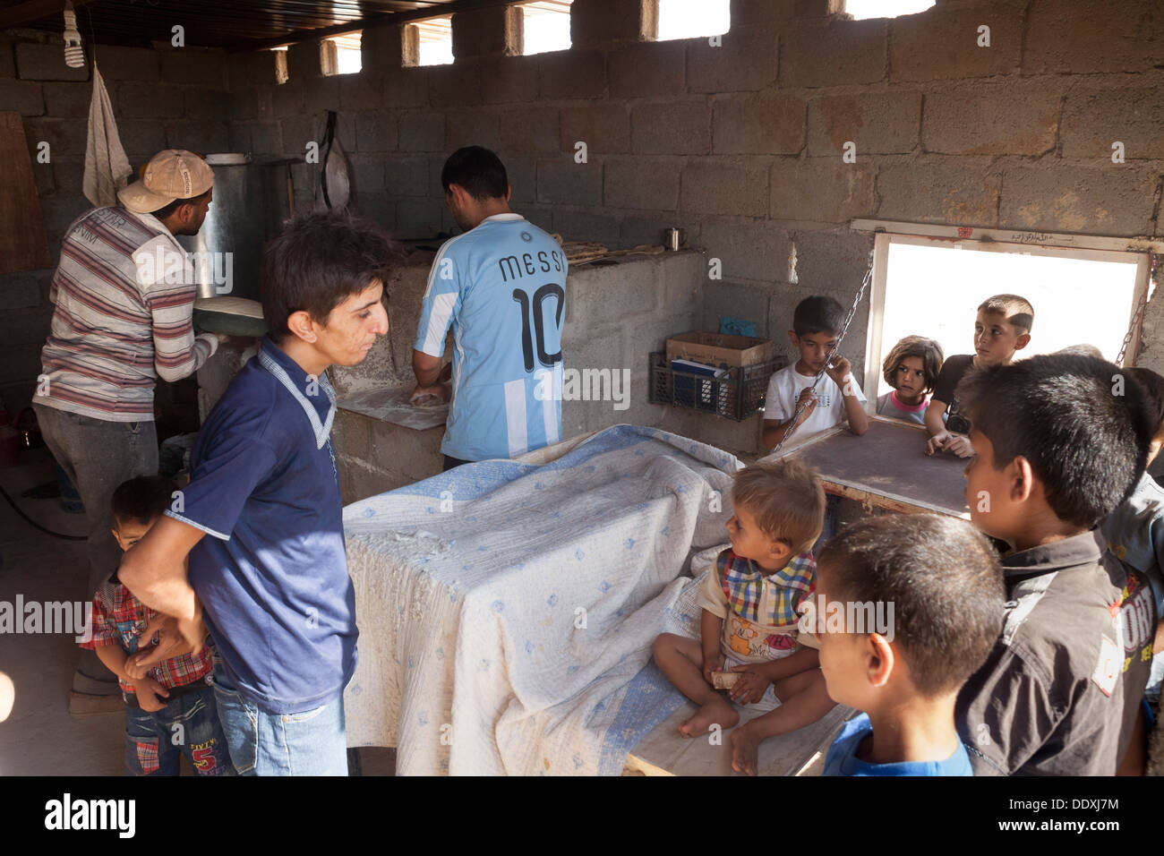 Domiz, Duhok province - Northern Iraq (Iraqi Kurdistan) - Domiz Refugees Camp Early morning waiting bread in a bakery Stock Photo