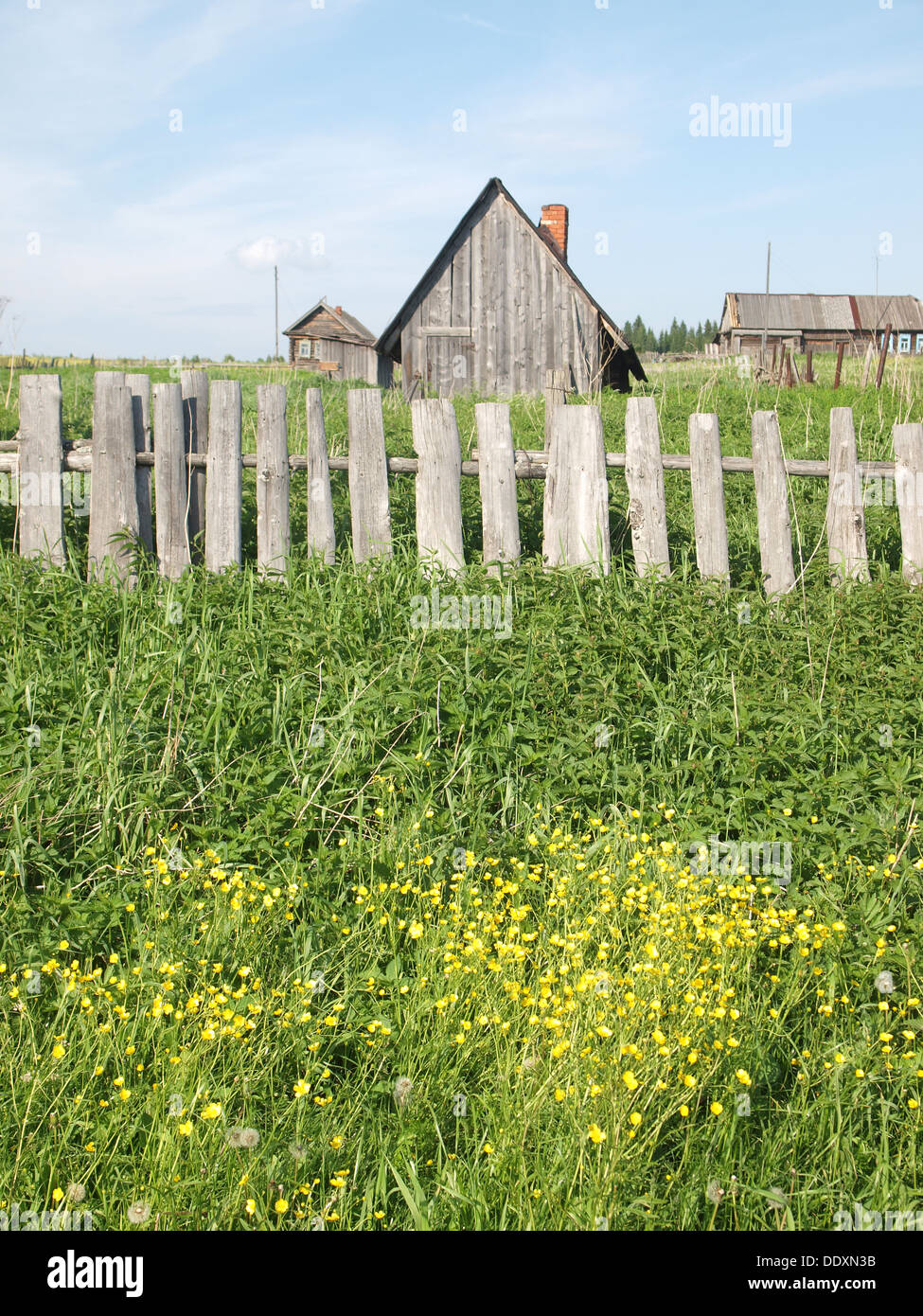 The old wooden house behind a fence. Russia Stock Photo - Alamy