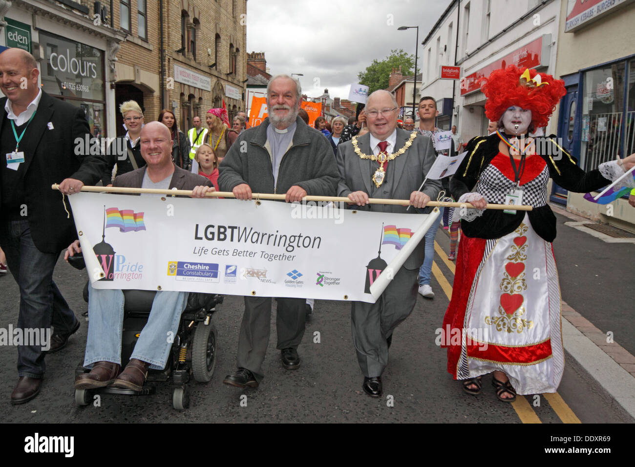 Vicar, 130th Lord mayor Councillor Peter Carey and Clair Haslam bannerat Warrington Pride September 2013 Cheshire England UK WA1 Stock Photo