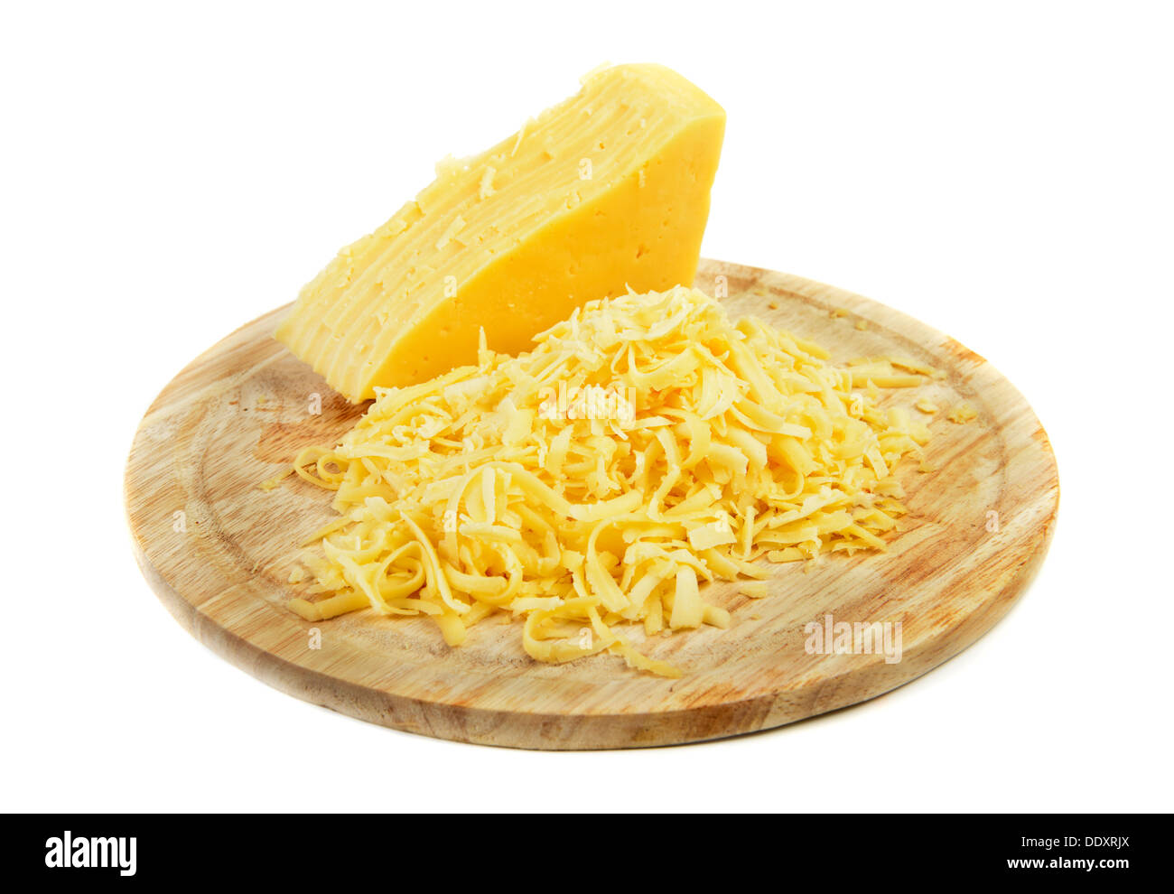 Grated cheese on a cutting board Stock Photo