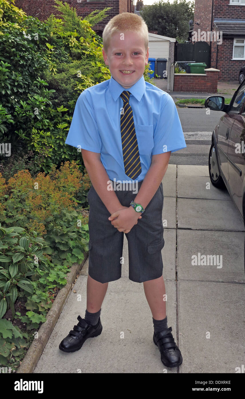 Schoolchild on first day of new term, in neat new school uniform, Cheshire, England, UK, WA4 Stock Photo