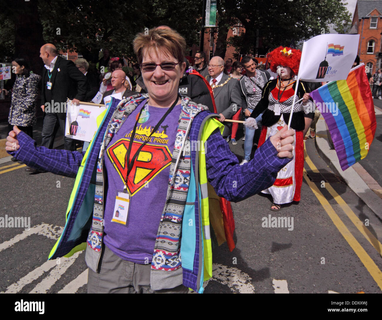 Lady with rainbow flag at Warrington Pride September 2013 Cheshire England UK WA1 Stock Photo
