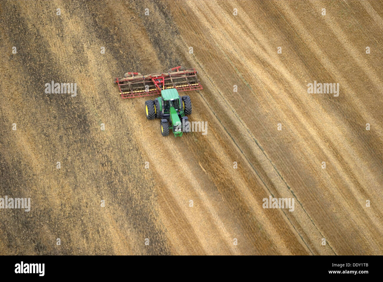 Tractor on field. Skåne. Sweden Stock Photo Alamy