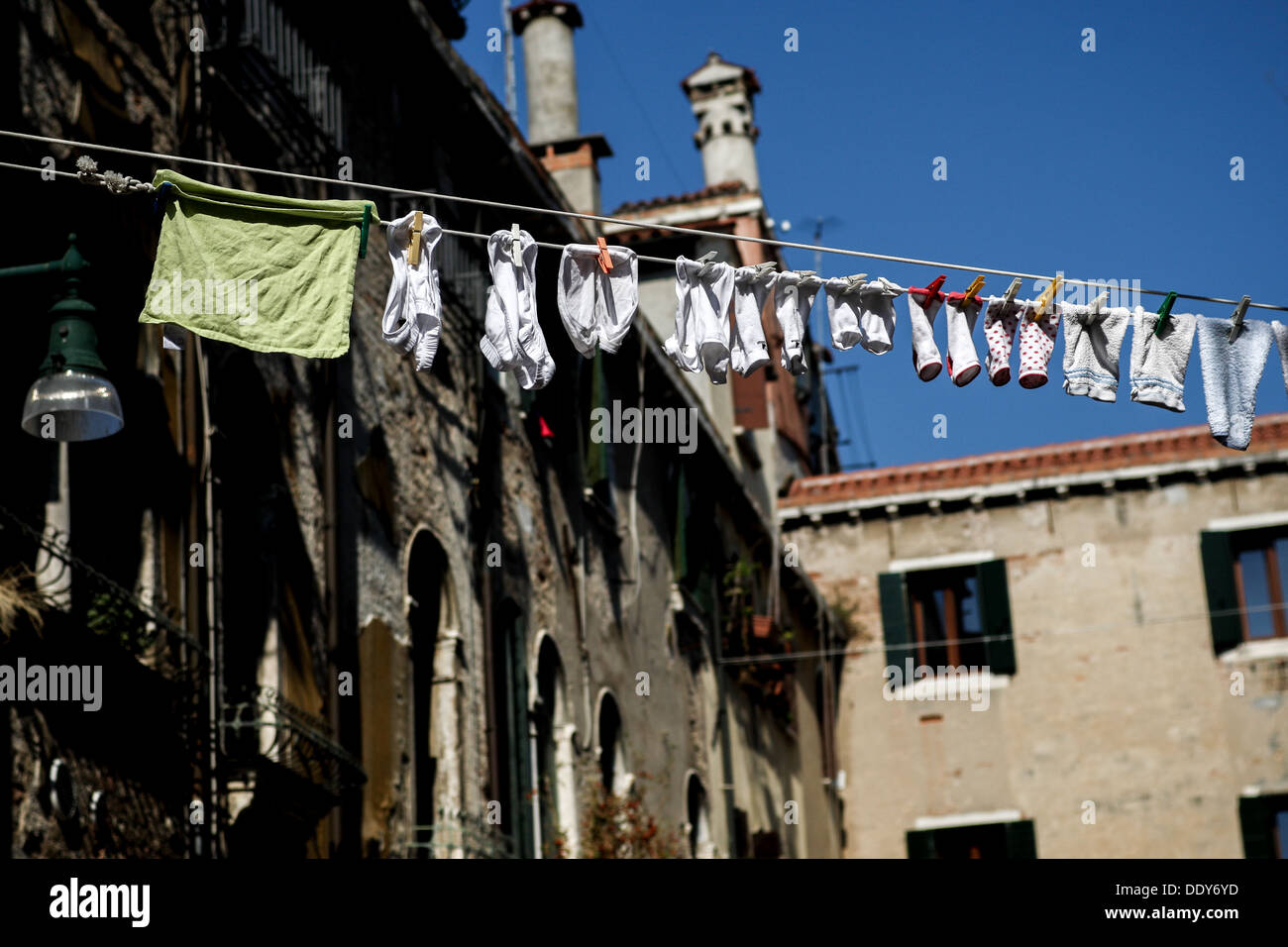 An authentic and charming scene of Venice Laundry hanging on the