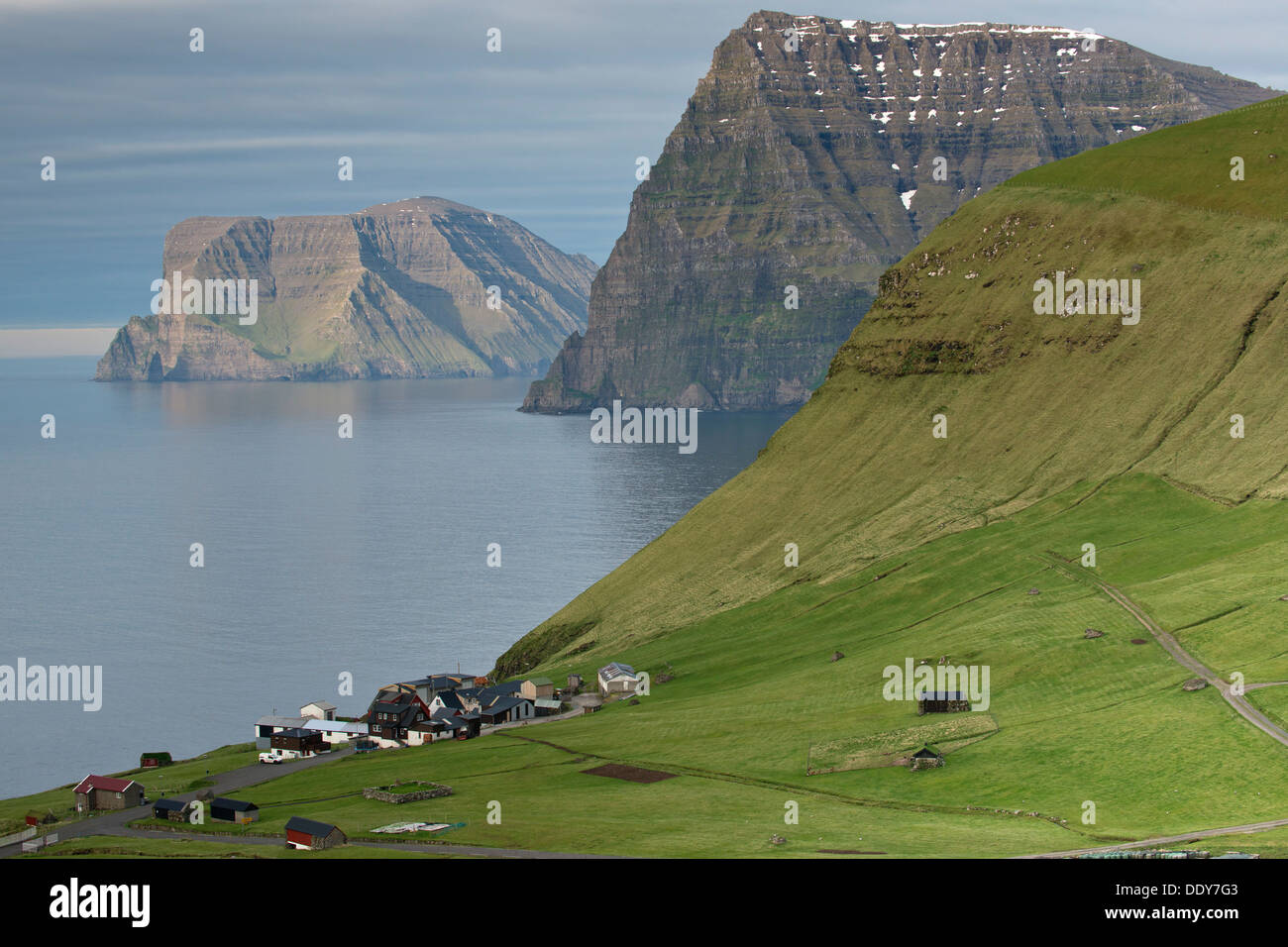 Island of Viðoy with Cape Enniberg and the village of Kunoy Stock Photo