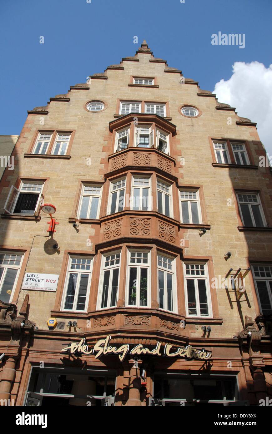 Building at Lisle Street, Leicester Square, The West End. Below, The