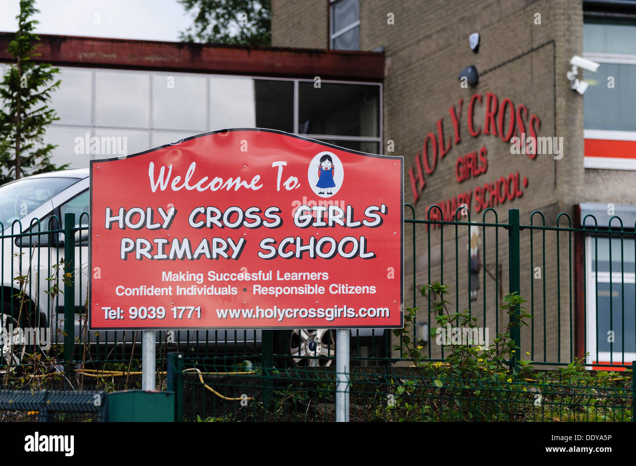 Holy Cross Girl's Primary School, situated in a 'Protestant Area' it has been the scenes of violent protests in 2001 and 2002, and tensions still run high in the surrounding area. It is run by the CCMS (Council for Catholic Maintained Schools) Stock Photo