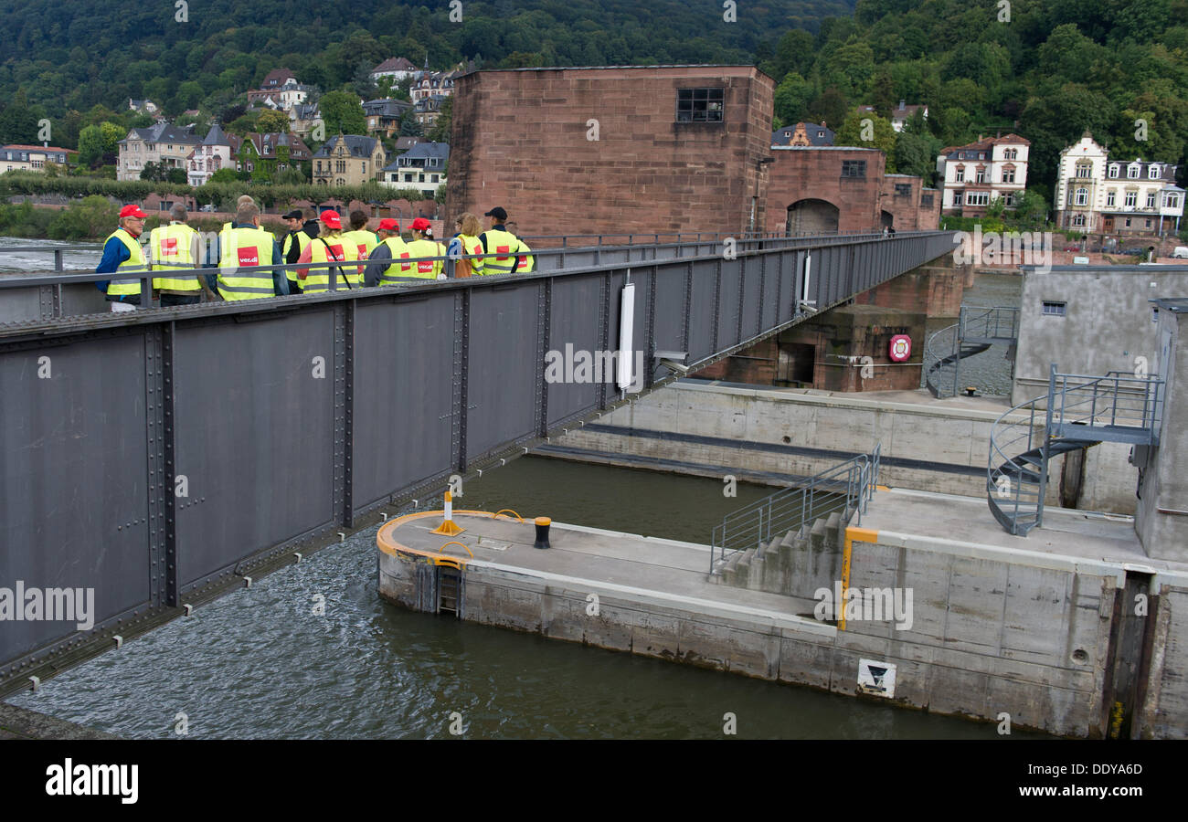 Heidelberg, Germany. 09th Sep, 2013. Members of union Verdi stand on a Neckar river sluice in Heidelberg, Germany, 09 September 2013. The strikes at the sluices in the southwest of Germany only caused delays thanks to substitute staff. New talks with the respective federal minstries are scheduled. Photo: UWE ANSPACH/dpa/Alamy Live News Stock Photo