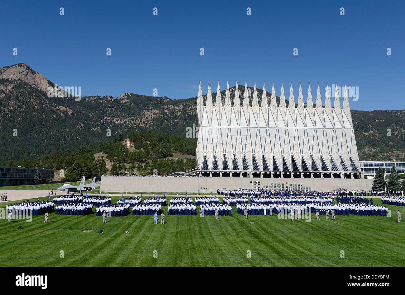The U.S. Air Force Academy Cadet Wing stands in formation on the parade ground during change of command ceremony August 12, 2013 in Colorado Springs, CO. Stock Photo