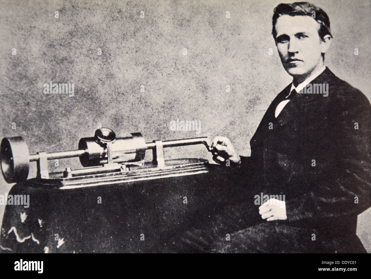 Thomas Alva Edison sitting beside his invention, the phonograph, 1878. Artist: Unknown Stock Photo