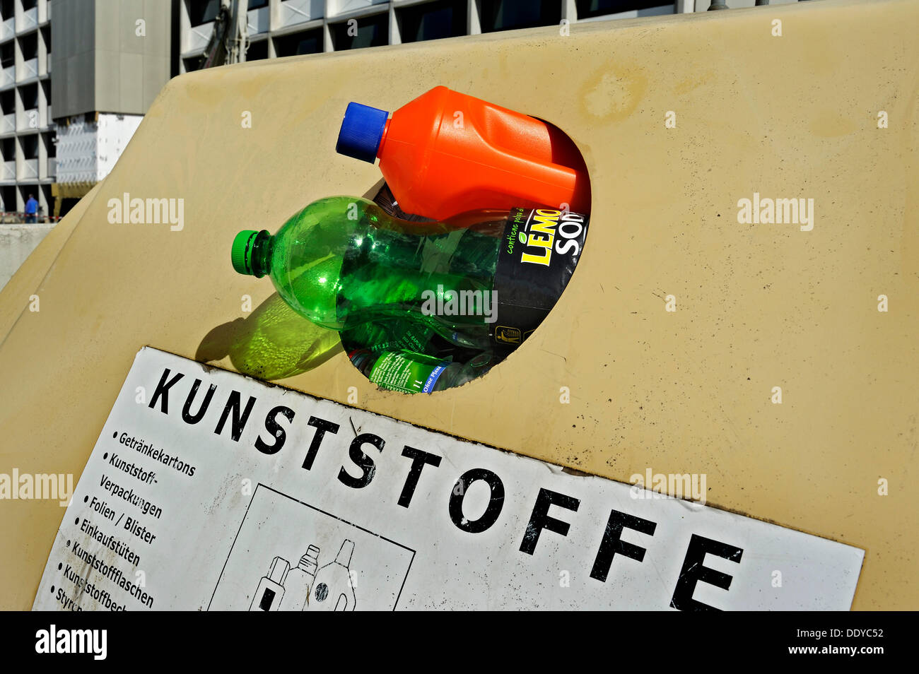 Jam-packed plastics recycling container in the former Olympic Village, Munich, Bavaria Stock Photo