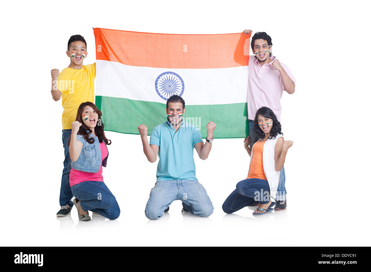Portrait of happy young friends with Indian flag cheering over white background Stock Photo