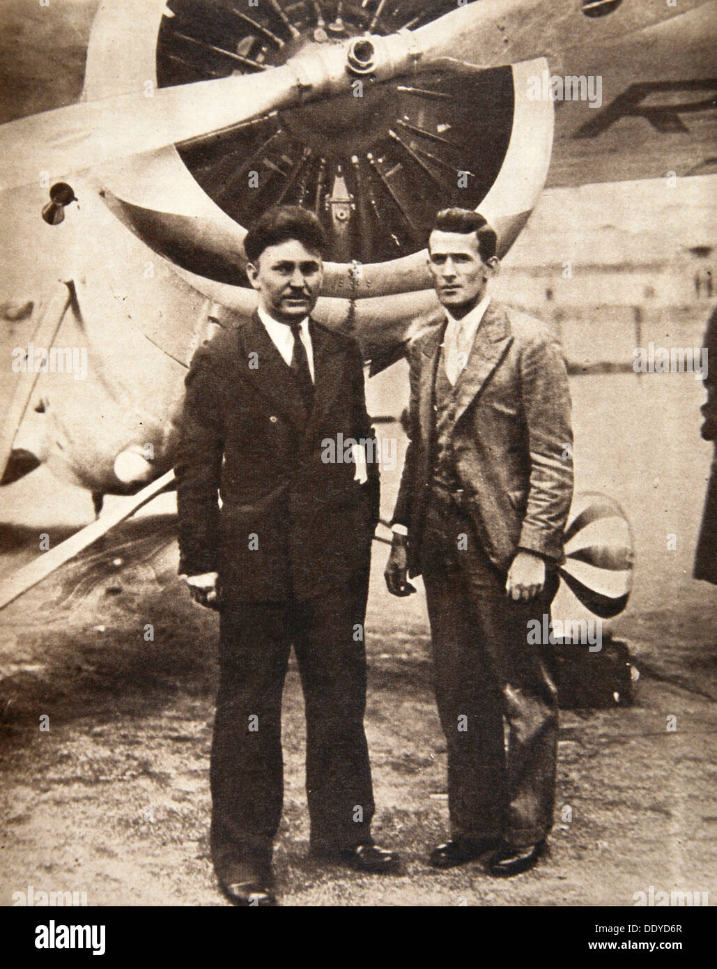Aviators Wiley Post and Harold Gatty in front of 'Winnie Mae', New York, USA, 1931. Artist: S and G Stock Photo