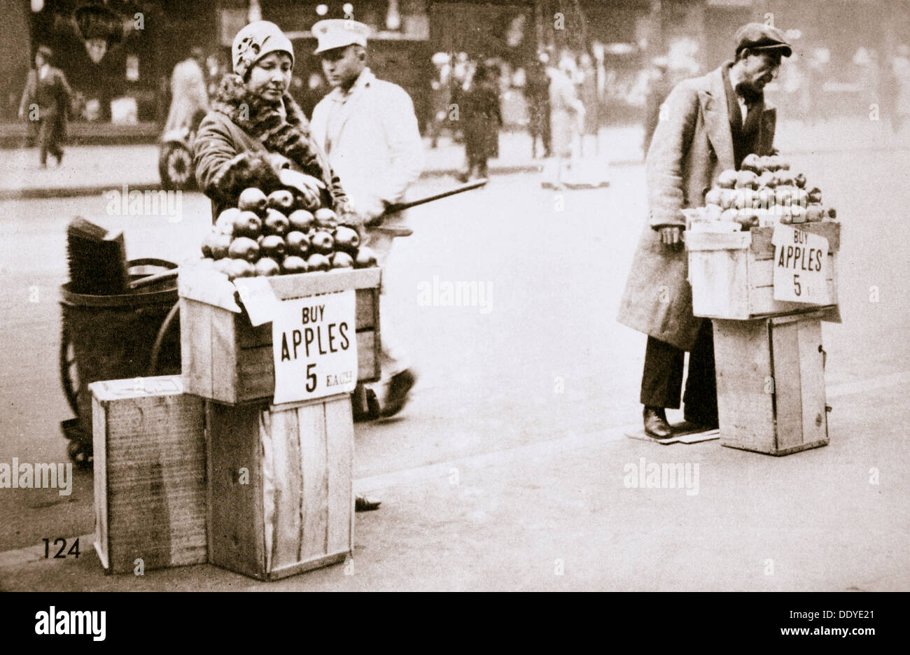 Jobless New Yorkers selling apples on the pavement, Great Depression, New York, USA, 1930. Artist: Unknown Stock Photo