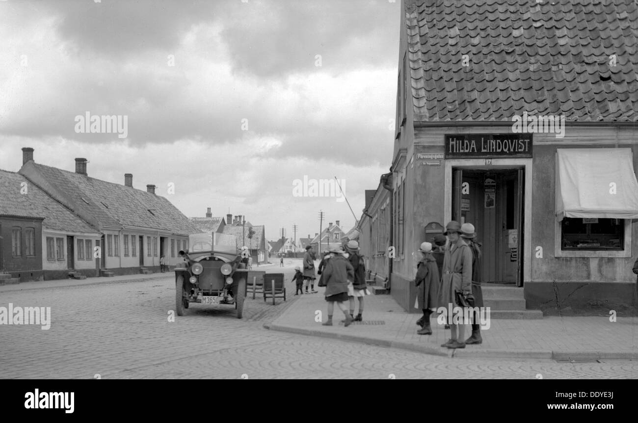 Parked car and children on a street corner, Landskrona, Sweden, 1925. Artist: Unknown Stock Photo