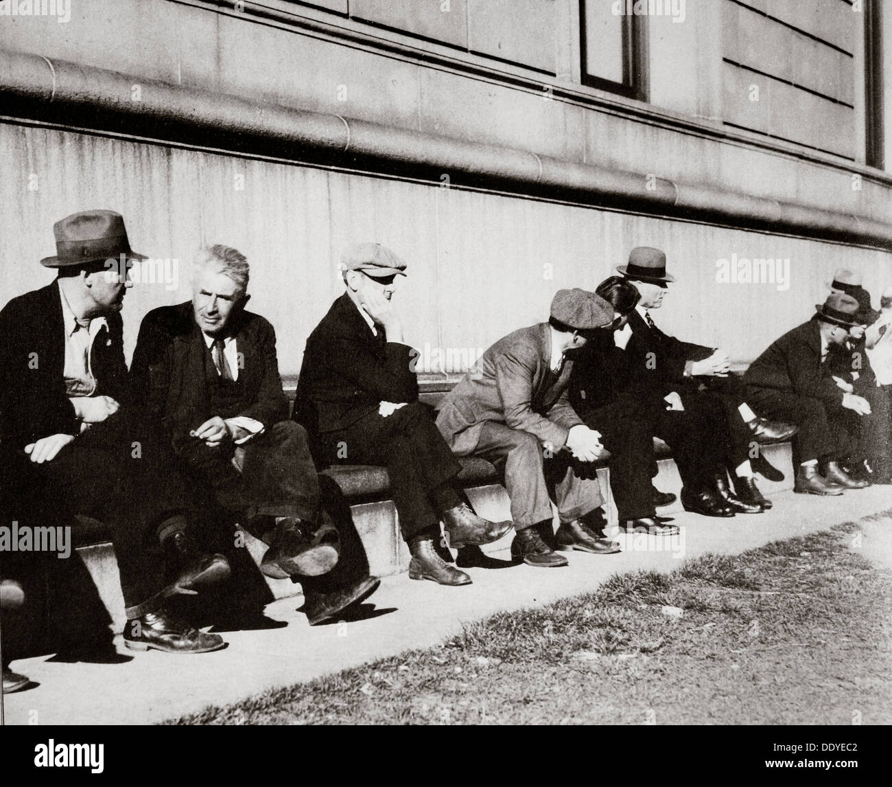 Unemployed men sitting outside the Public Library, San Francisco, California, USA, February 1937. Artist: Unknown Stock Photo