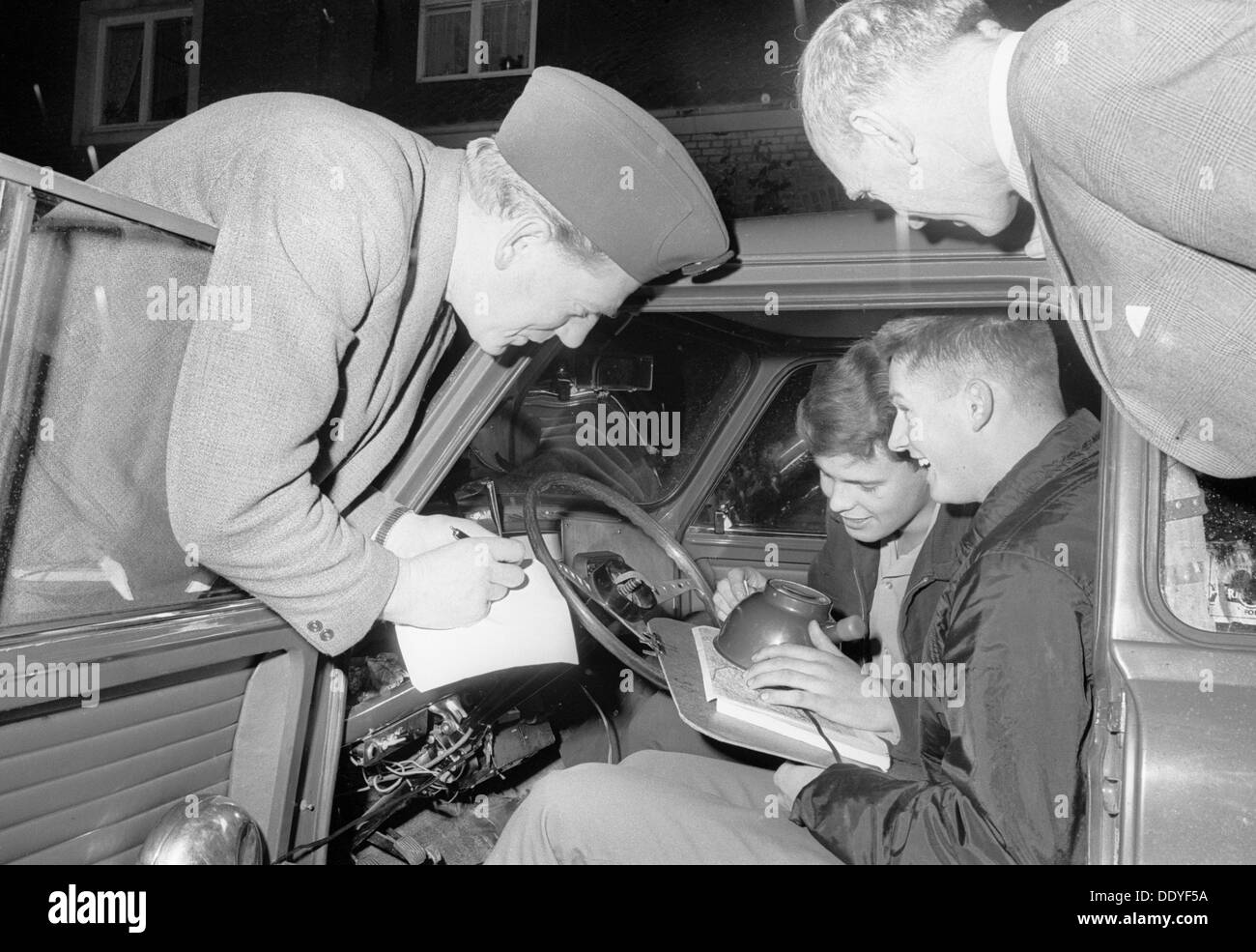 Studying the map in a car rally, Landskrona Motor Club, Sweden, 1965. Artist: Unknown Stock Photo