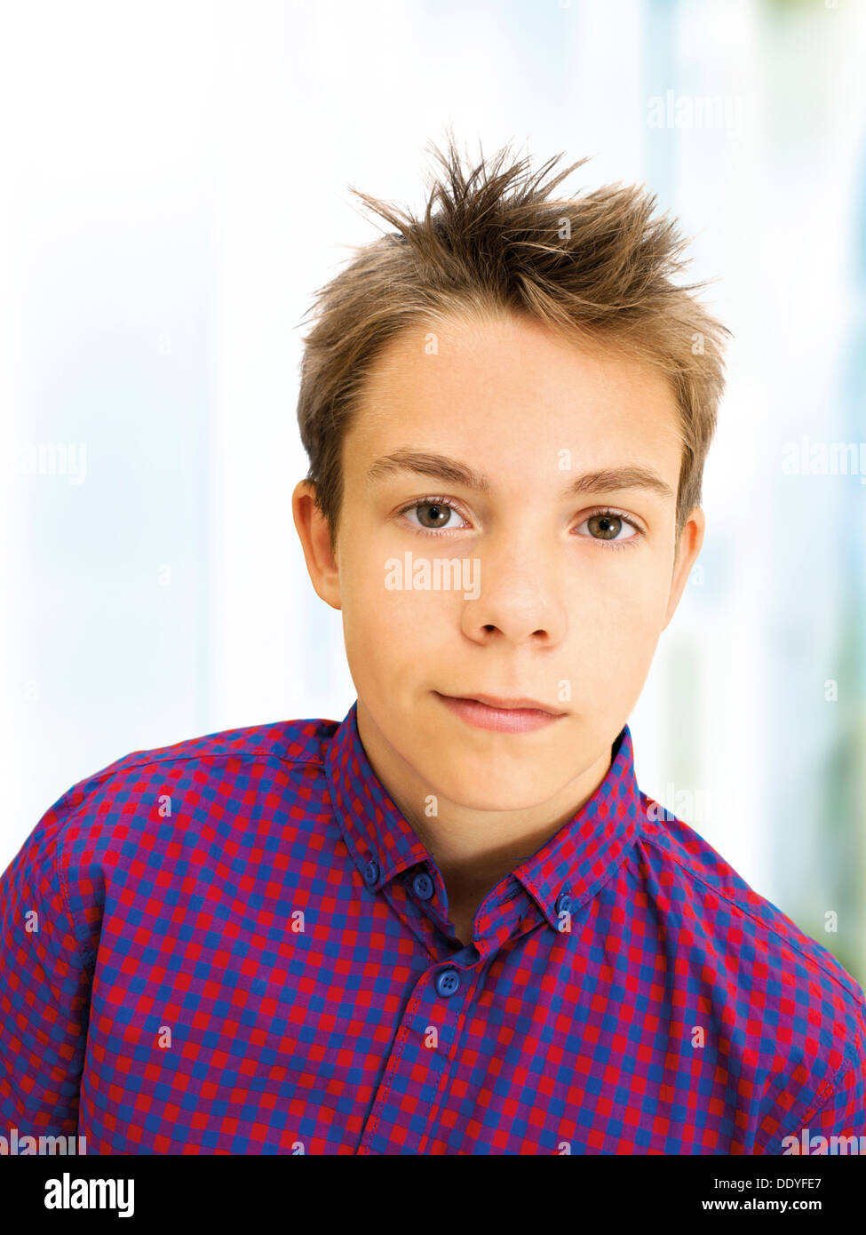 Portrait, boy, teenager with a serious expression Stock Photo Alamy