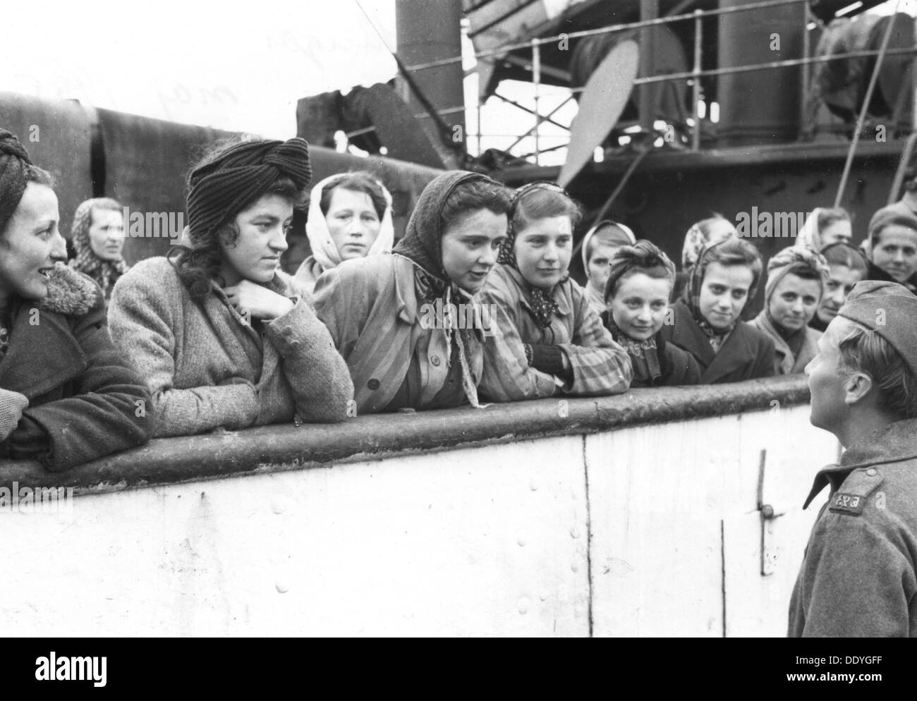 Women talking to a soldier, Trelleborg harbour, Sweden, May 1945. Artist: Unknown Stock Photo