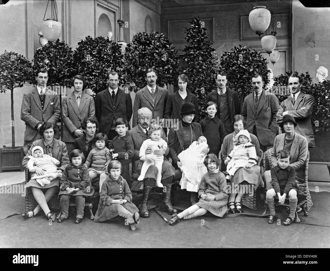 The 9th Duke of Devonshire with his children and grandchildren at Chatsworth, Christmas 1925. Artist: JR Board Stock Photo