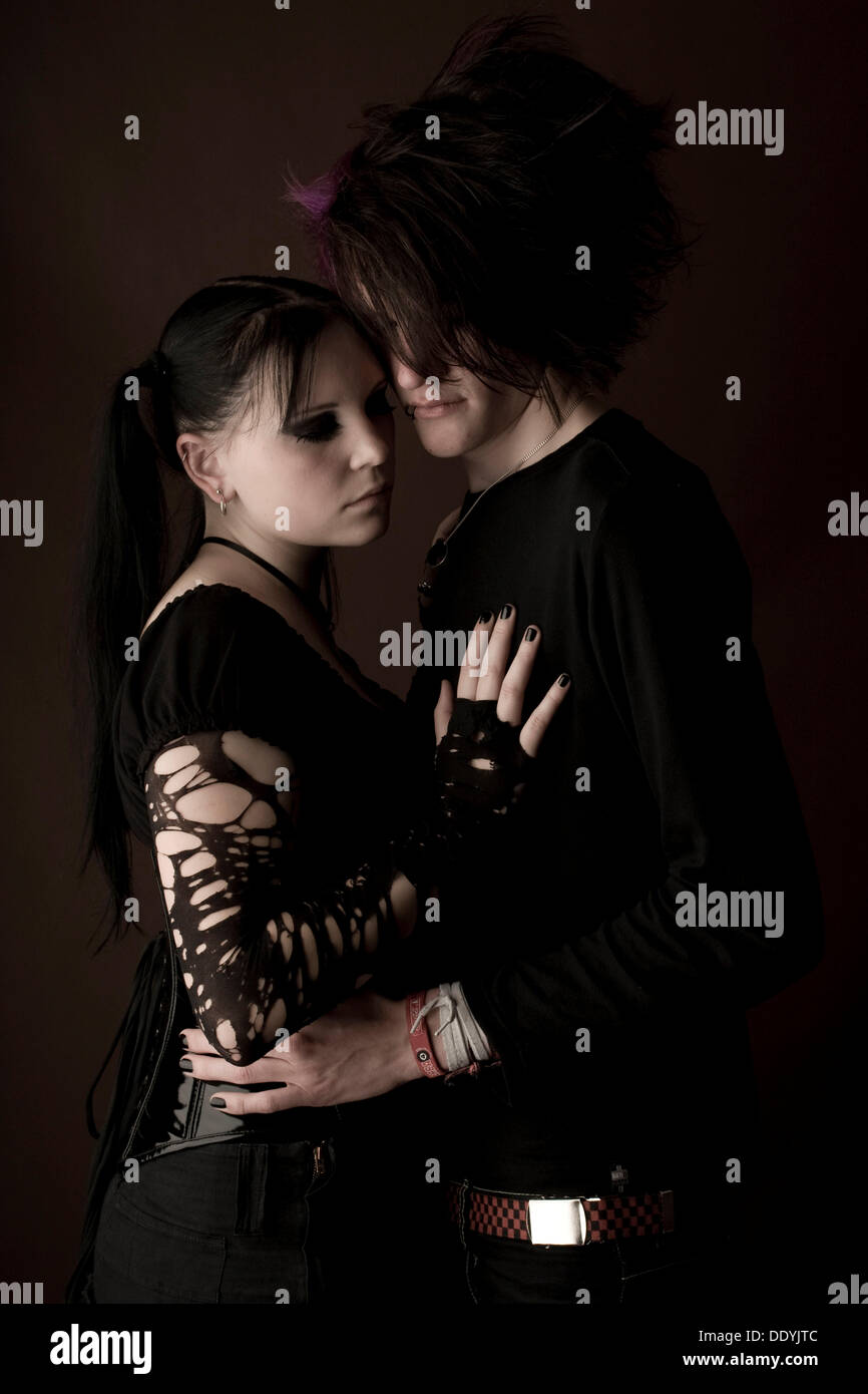 Embracing couple, Gothic style, emo style, serious faces Stock Photo