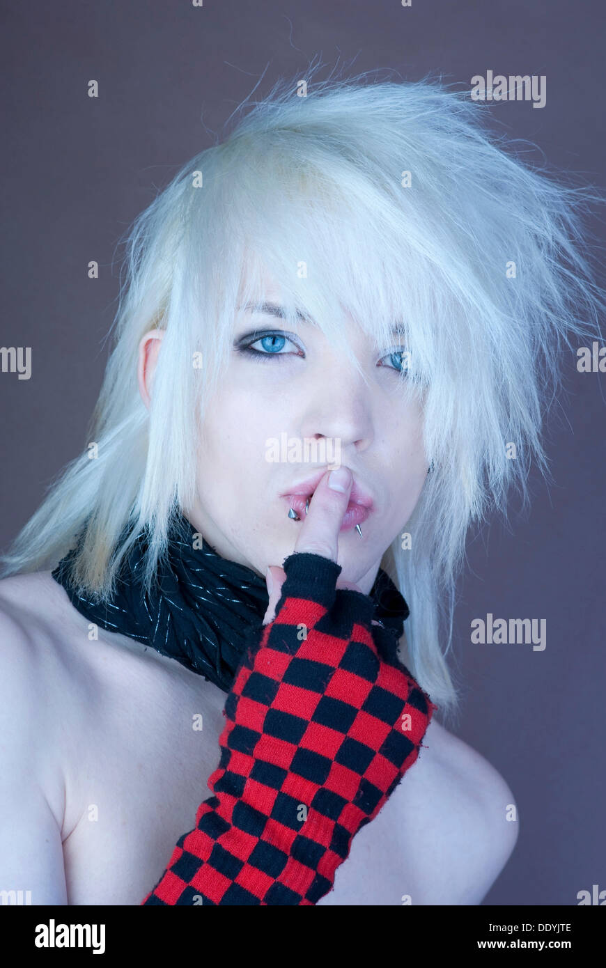 Blond man, Manga style, Punk style, fingers, lips Stock Photo