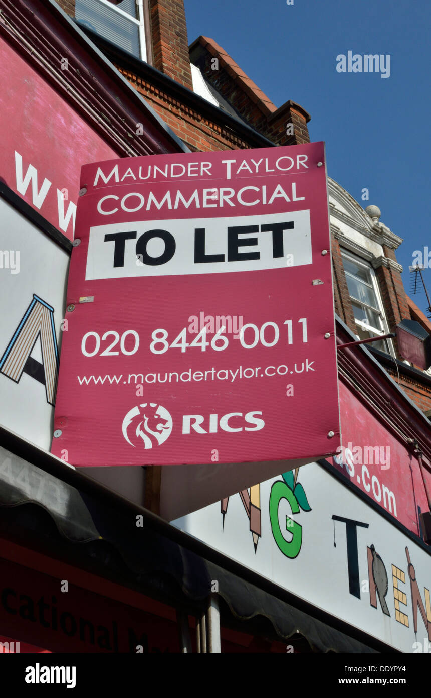 Commercial 'To Let' sign on a UK High Street Stock Photo Alamy