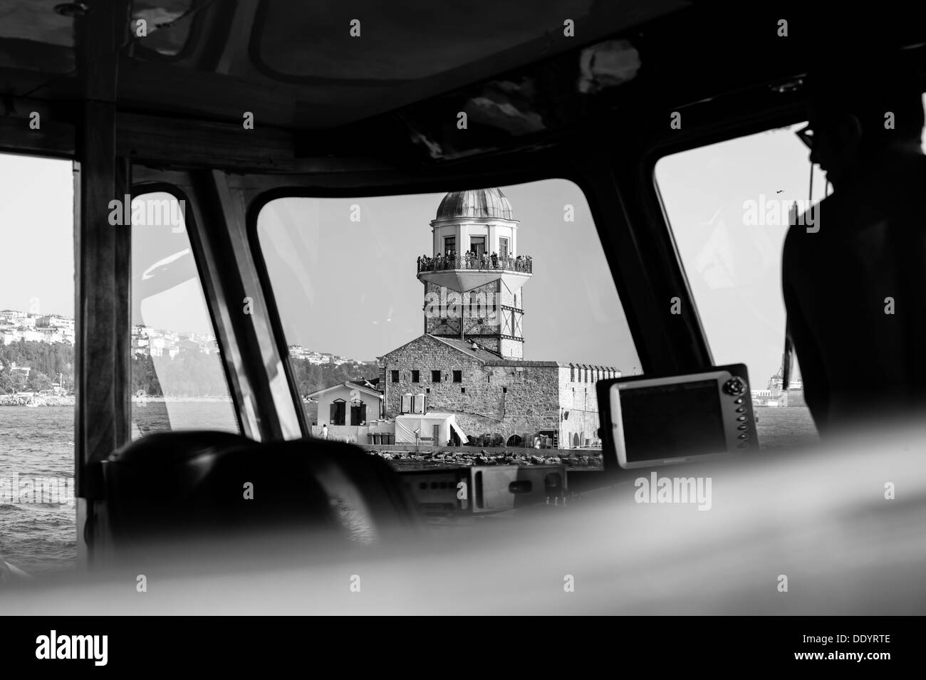 Onboard a boat on the Bosphorus River In Istanbul with the Maiden's Tower Kız Kulesi through the window Stock Photo