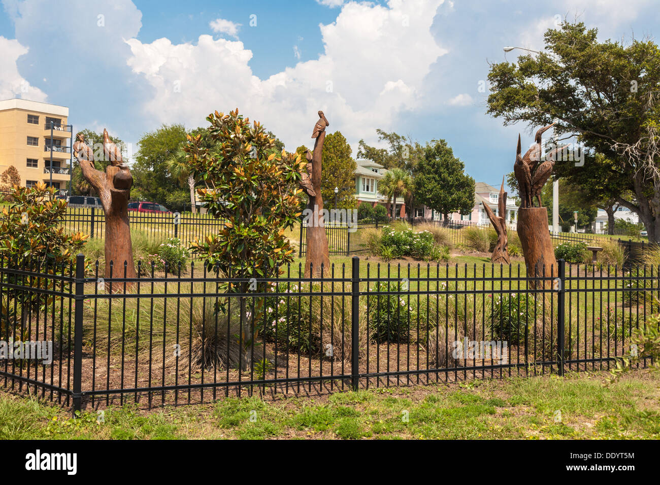 Sculptures of wildlife by Dayton Scroggins carved from tree trunks in the Katrina Sculpture Garden on Highway 90 in Biloxi, MS Stock Photo