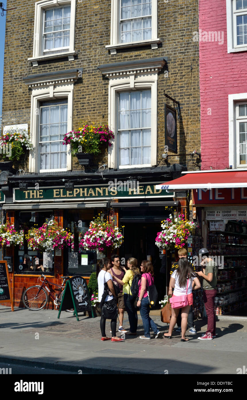 Young tourists outside the Elephants Head pub in Camden Town, London, UK. Stock Photo