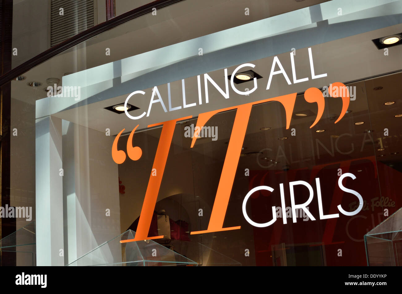 'Calling All IT Girls' sign on a shop window, Leeds, UK Stock Photo