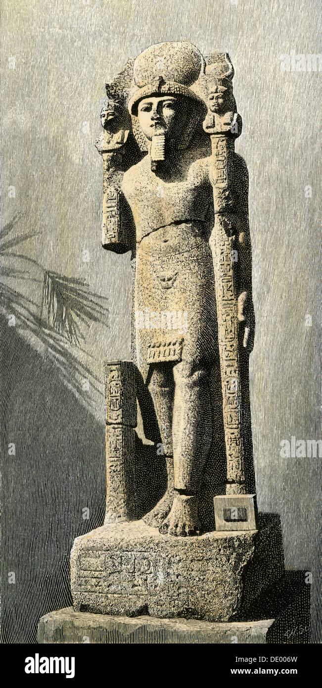 Ramses II as regent of Egypt. Hand-colored woodcut of a statue from Gizeh Stock Photo
