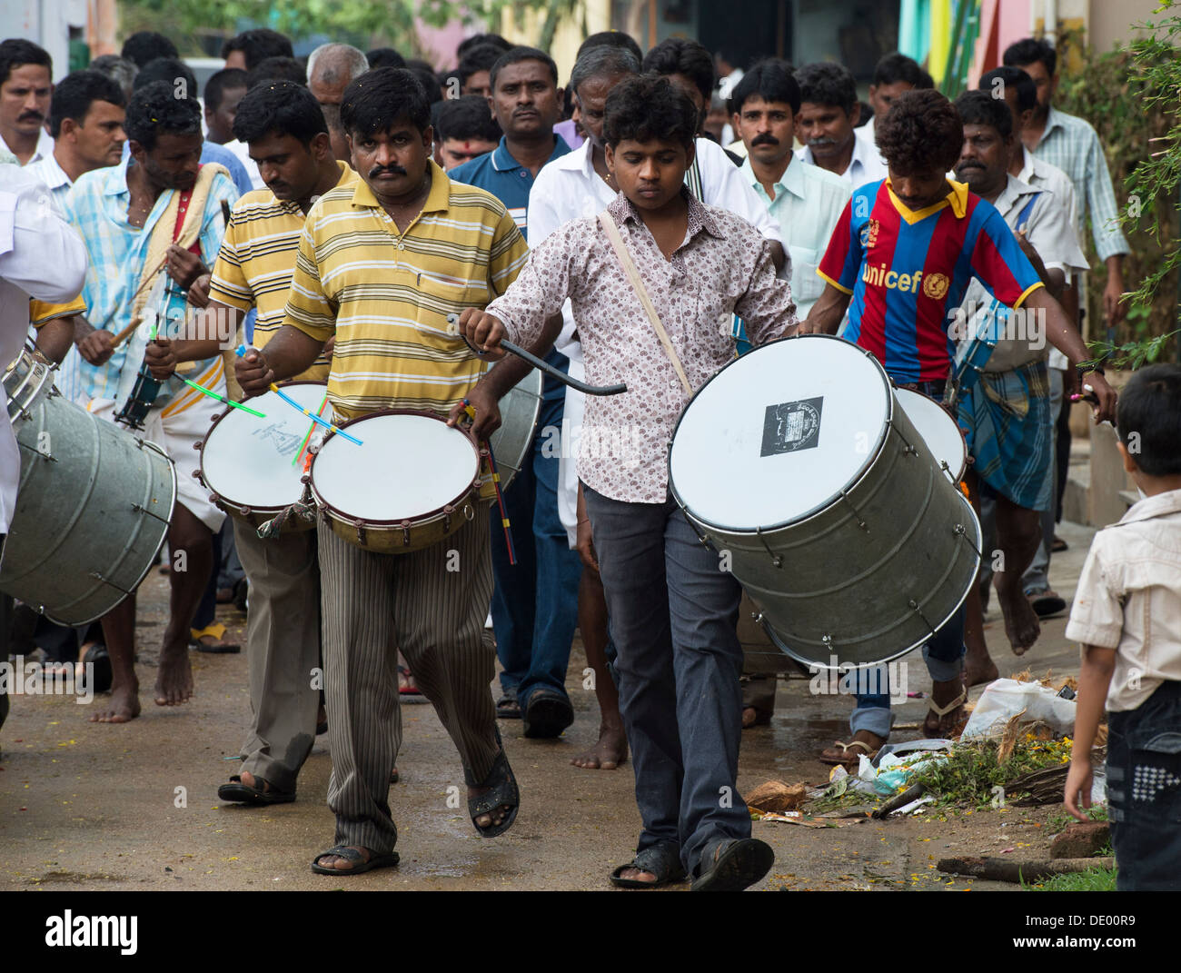 Indian drummers in an Indian street during the hindu Ganesha Chaturthi Festival . Puttaparthi, Andhra Pradesh, India Stock Photo