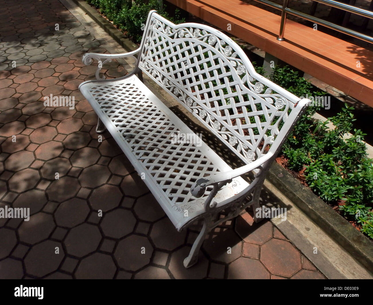 White bench in garden Stock Photo - Alamy