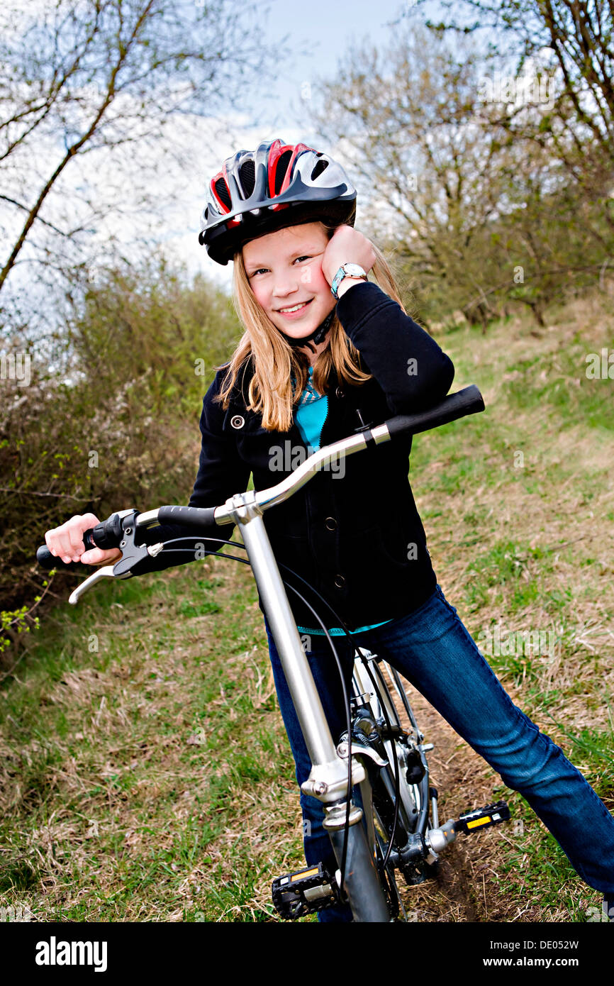 Girl, teenage, cycle helmet hi-res 