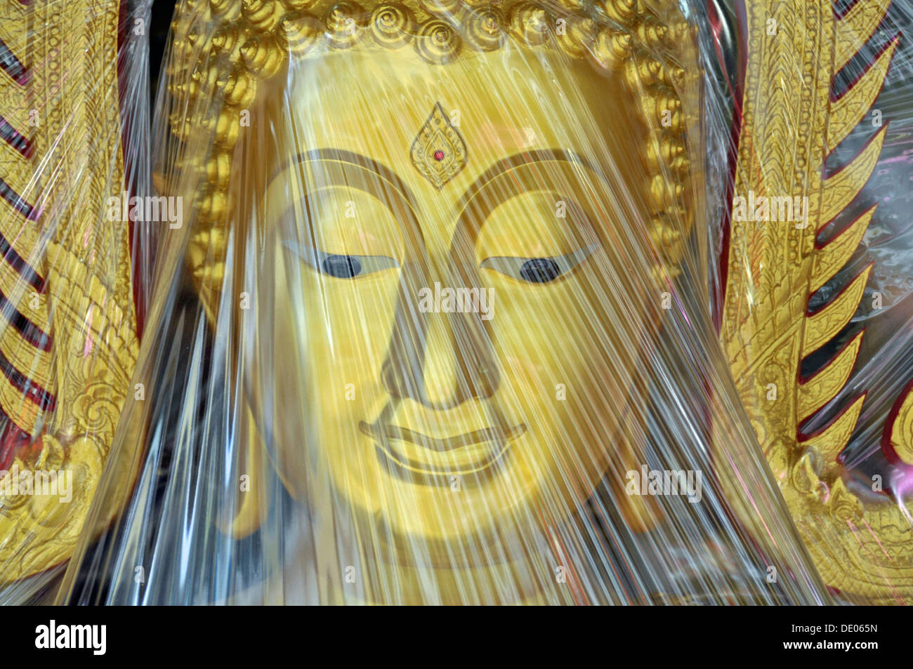 Buddha statue covered with plastic foil, produced in a small factory, Bamrung Muang Road, Bangkok, Thailand, Asia, PublicGround Stock Photo