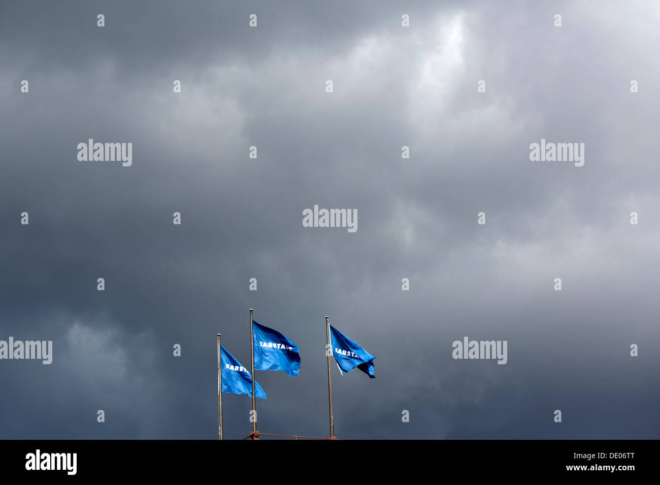 Flags of Karstadt, dark clouds, storms, symbolic image Stock Photo