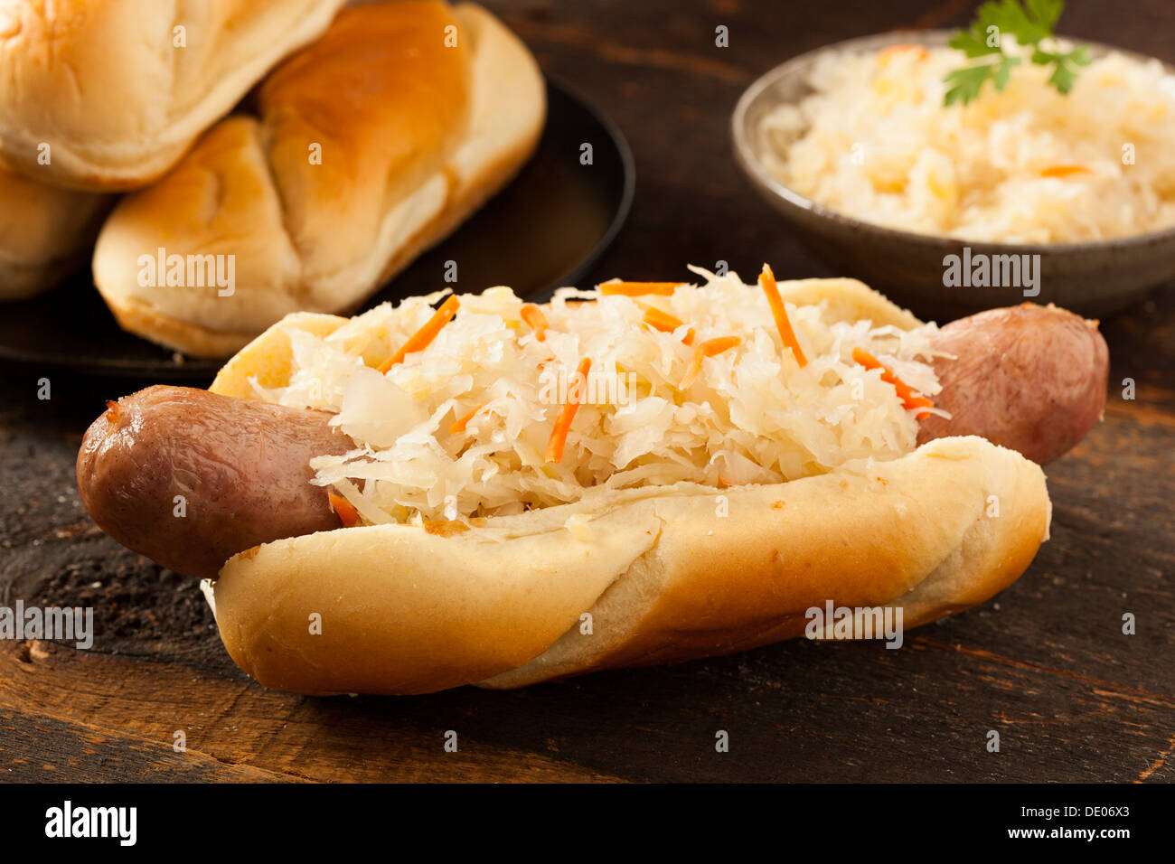 Homemade Bratwurst with Sauerkraut on a Roll Stock Photo Alamy