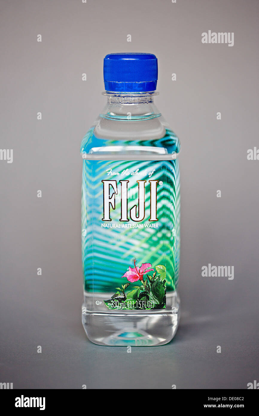 A plastic bottle containing water from Fiji, mineral water from an artesian well on the island of Viti Levu Stock Photo