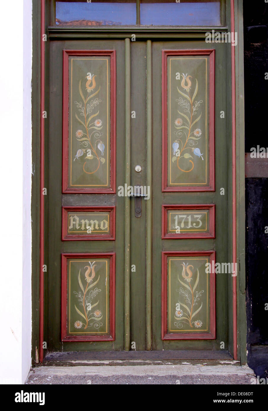 Colourfully painted old door from 1713 in Bogense, Funen, Fyn, Denmark, Europe Stock Photo