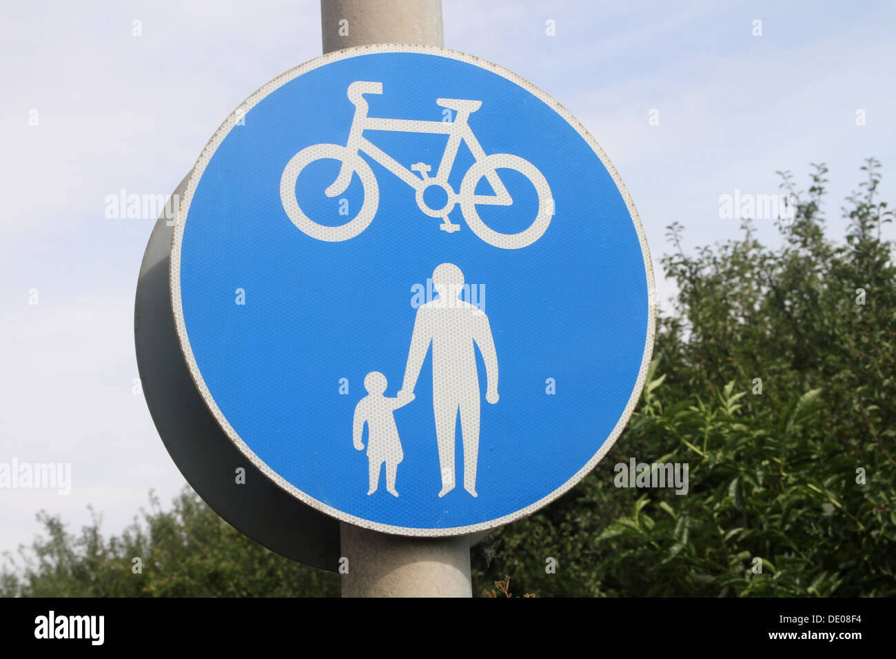 A segregated walking and cycling sign in England Stock Photo