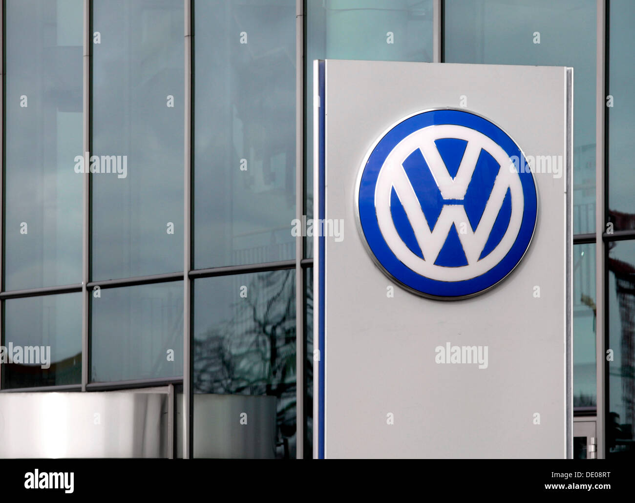 Volkswagen logo in front of the Volkswagen Arena Wolfsburg, soccer stadium, Wolfsburg, Lower Saxony Stock Photo