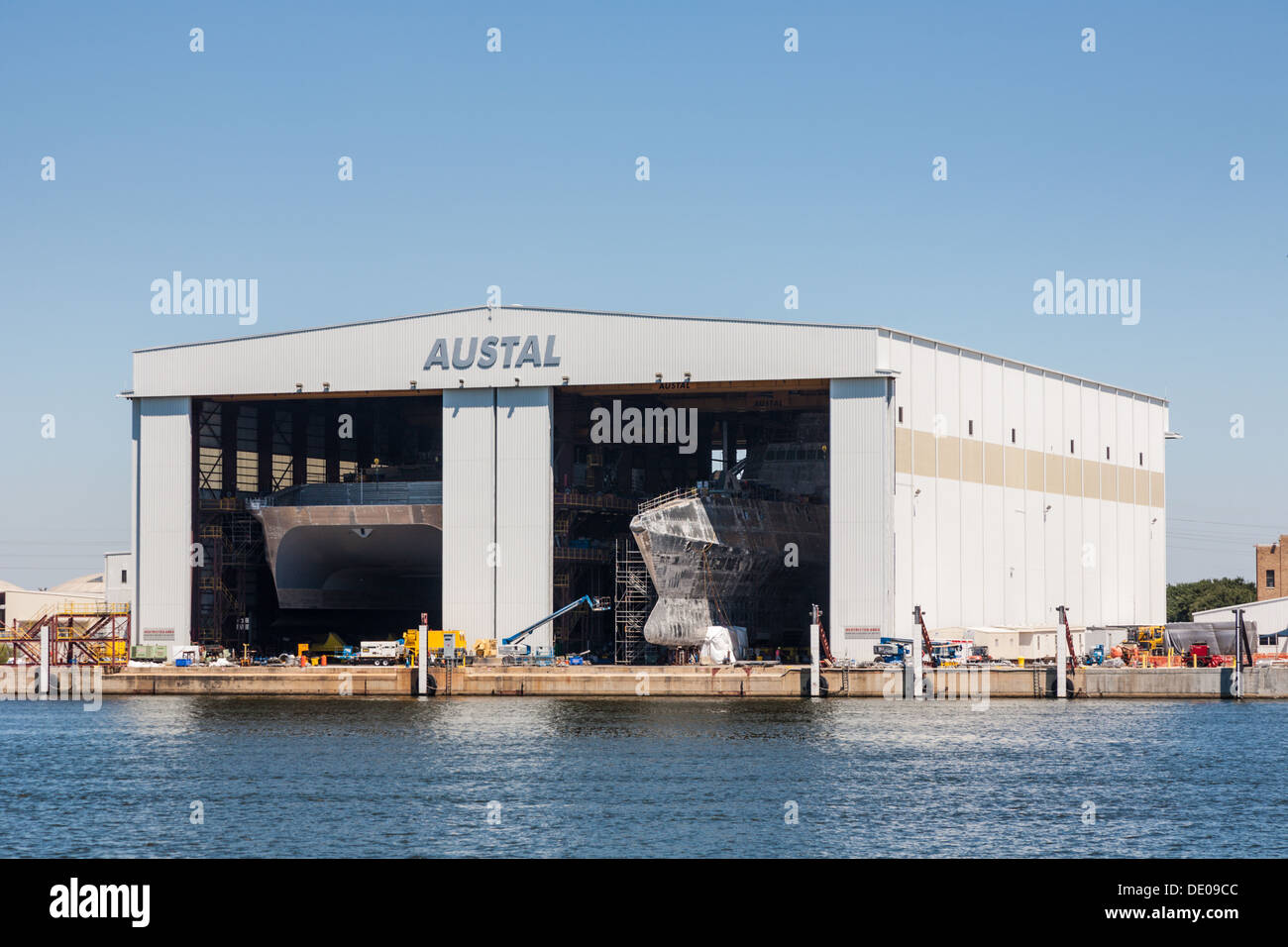 Ships being built in the Austal ship yard building on Mobile Bay in Mobile, Alabama Stock Photo